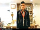 ورزشکار افغانستانی مدال خود را به موزه آستان مقدس قم اهدا کرد