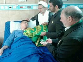 عیادت خدام بارگاه منور رضوی از بیماران در تهران