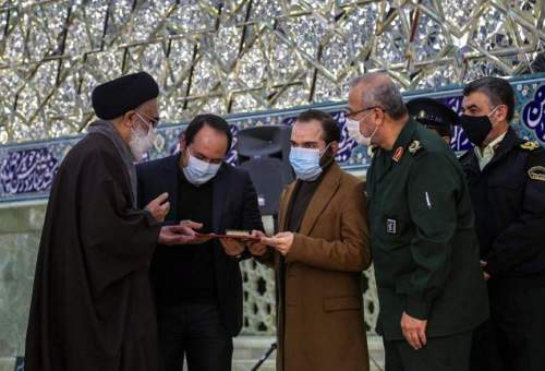خانواده شهید فخری‌زاده دانشمند هسته‌ای در قم تقدیر شدند