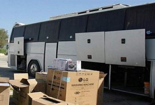 توقیف سه دستگاه اتوبوس حامل کالای قاچاق در عوارضی قم-تهران