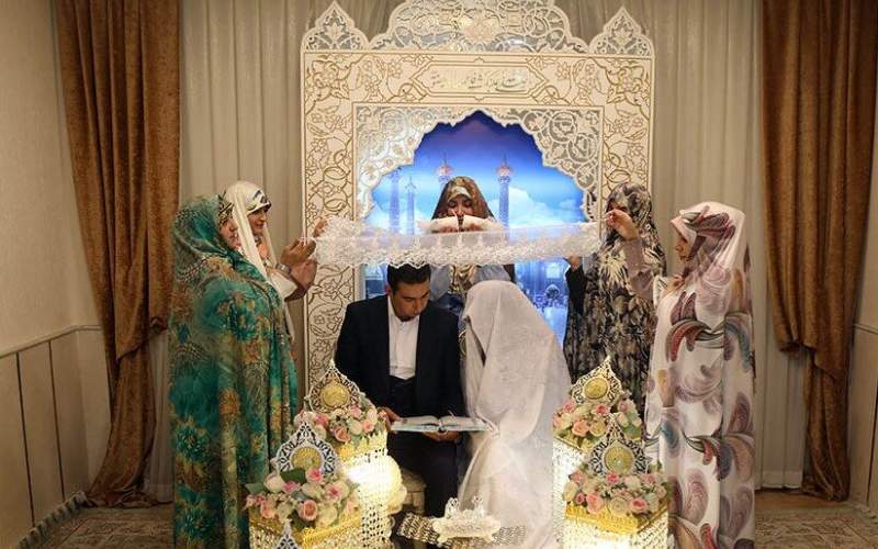 عقد ازدواج ۱۰۰ زوج جوان در روز بزرگداشت میلاد حضرت معصومه (س)